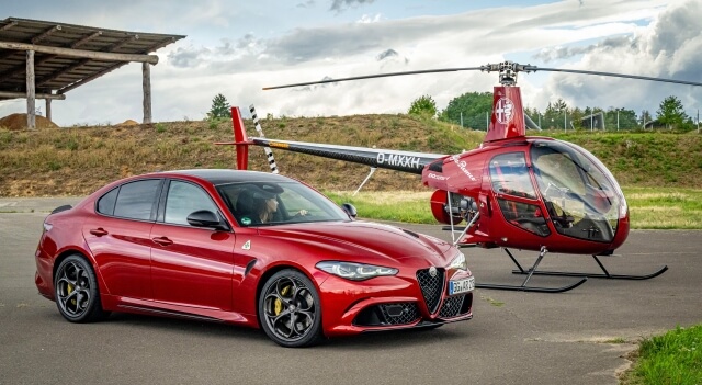Giulia QV und Hubschrauber